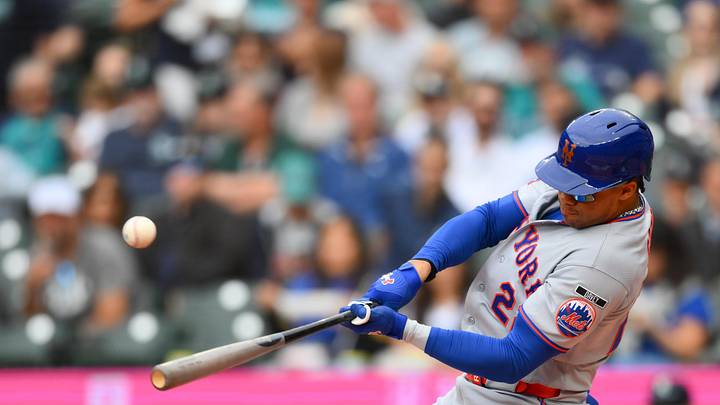 Jun 3, 2026; Seattle, Washington, USA; New York Mets designated hitter Juan Soto (22) hits a single against the Seattle Mariners during the first inning at T-Mobile Park. Mandatory Credit: Steven Bisig-Imagn Images