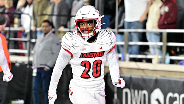 Oct 25, 2024; Chestnut Hill, Massachusetts, USA; Louisville Cardinals defensive back Tayon Holloway (20) reacts to his defensive play against the Boston College Eagles during the second half at Alumni Stadium. Mandatory Credit: Eric Canha-Imagn Images Oct 25, 2024; Chestnut Hill, Massachusetts, USA; Louisville Cardinals defensive back Tayon Holloway (20) reacts to his defensive play against the Boston College Eagles during the second half at Alumni Stadium. Mandatory Credit: Eric Canha-Imagn Images