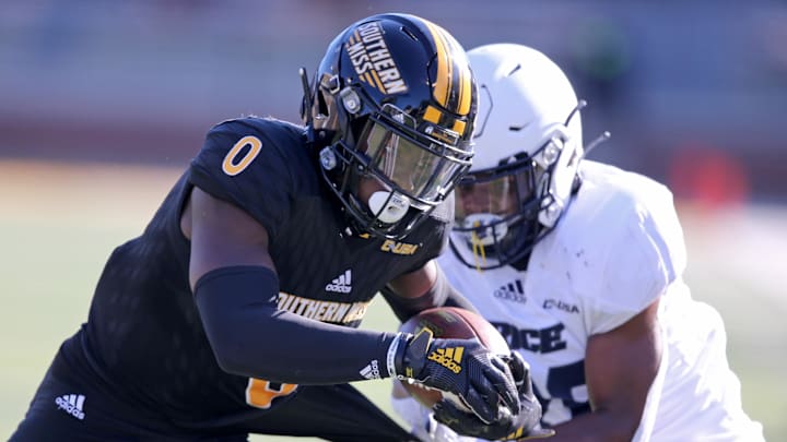 Gabe Taylor brings down Southern Miss's Demarcus Jones in 2020.
