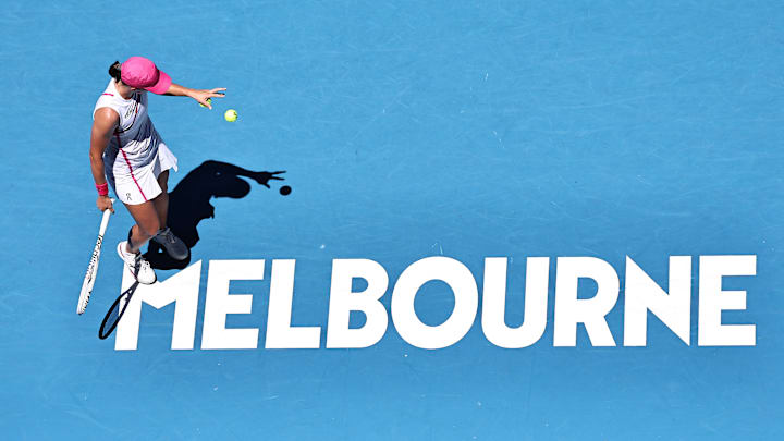 Iga Swiatek warms up before her match at the Australian Open.