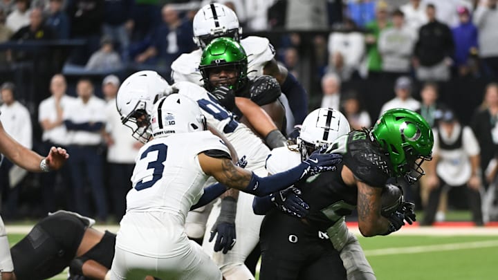 Oregon Ducks running back Jordan James (20) rushes for a touchdown against the Penn State Nittany Lions Oregon Ducks running back Jordan James (20) rushes for a touchdown against the Penn State Nittany Lions