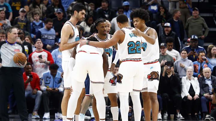 Dec 23, 2024; Memphis, Tennessee, USA; Memphis Grizzlies forward Santi Aldama (7), forward Jaren Jackson Jr. (13), guard Ja Morant (12), guard Desmond Bane (22) and forward Jaylen Wells (0) huddle during the fourth quarter against the Los Angeles Clippers at FedExForum. Mandatory Credit: Petre Thomas-Imagn Images
