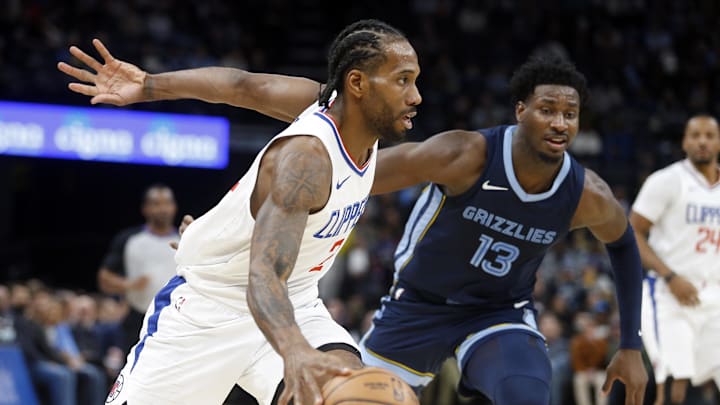  Los Angeles Clippers forward Kawhi Leonard (2) drives to the basket as Memphis Grizzlies forward-center Jaren Jackson Jr. (13) defends during the second half at FedExForum. Mandatory Credit: Petre Thomas-Imagn Images