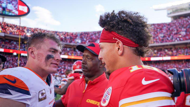 Nov 10, 2024; Kansas City, Missouri, USA; Kansas City Chiefs quarterback Patrick Mahomes (15) greets Denver Broncos quarterback Bo Nix (10) after the game at GEHA Field at Arrowhead Stadium. Mandatory Credit: Denny Medley-Imagn Images