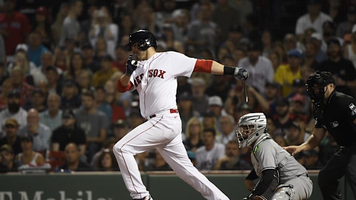 Boston Red Sox designated hitter J.D. Martinez (28) hits into an inning ending double play during the eighth inning against the New York Yankees at Fenway Park in 2022.