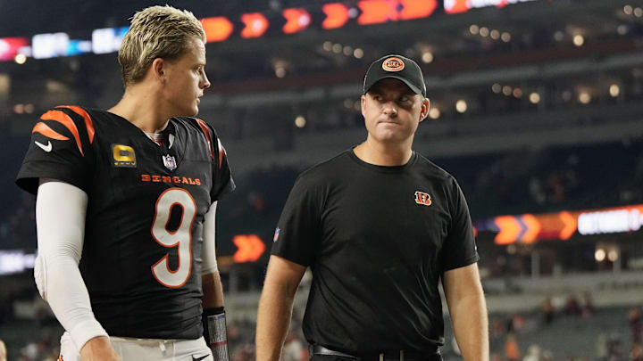 Cincinnati Bengals quarterback Joe Burrow and coach Zac Taylor walk off the field following a loss to the Washington Commanders on Sept. 23, 2024.