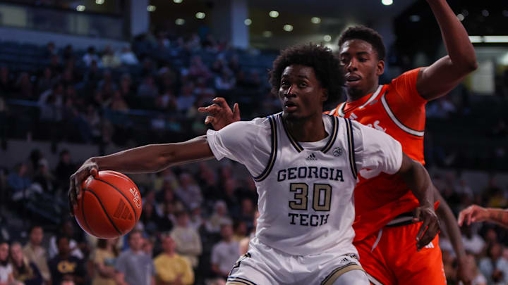 Mar 4, 2025; Atlanta, Georgia, USA; Georgia Tech Yellow Jackets forward Ibrahim Souare (30) handles the ball against the Miami Hurricanes in the second half at McCamish Pavilion. Mandatory Credit: Brett Davis-Imagn Images