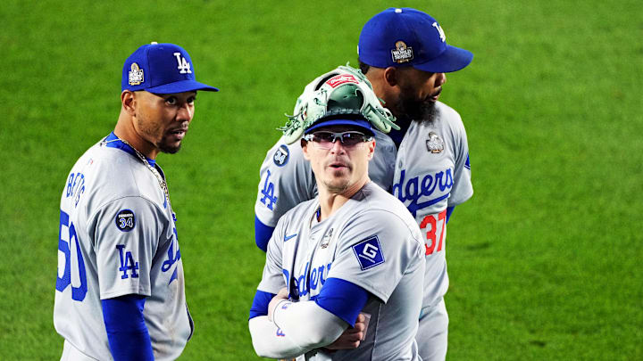 Oct 28, 2024; New York, New York, USA; Los Angeles Dodgers shortstop Mookie Betts (50), third baseman Enrique Hernandez (8) and outfielder Teoscar Hernandez (37) wait in the outfield for a pitching change during the seventh inning against the New York Yankees in game three of the 2024 MLB World Series at Yankee Stadium. Mandatory Credit: Robert Deutsch-Imagn Images Oct 28, 2024; New York, New York, USA; Los Angeles Dodgers shortstop Mookie Betts (50), third baseman Enrique Hernandez (8) and outfielder Teoscar Hernandez (37) wait in the outfield for a pitching change during the seventh inning against the New York Yankees in game three of the 2024 MLB World Series at Yankee Stadium. Mandatory Credit: Robert Deutsch-Imagn Images