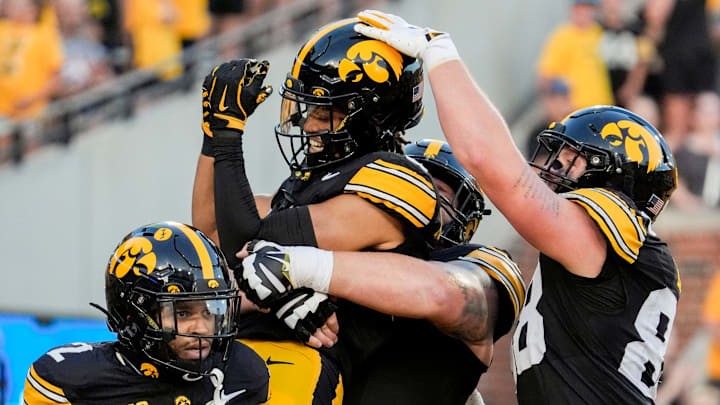Iowa Hawkeyes wide receiver Seth Anderson (6) is lifted into the air as teammates celebrate his touchdown with him during a football game against the Massachusetts Minutemen Sept. 13, 2025 at Kinnick Stadium in Iowa City, Iowa. Iowa Hawkeyes wide receiver Seth Anderson (6) is lifted into the air as teammates celebrate his touchdown with him during a football game against the Massachusetts Minutemen Sept. 13, 2025 at Kinnick Stadium in Iowa City, Iowa.