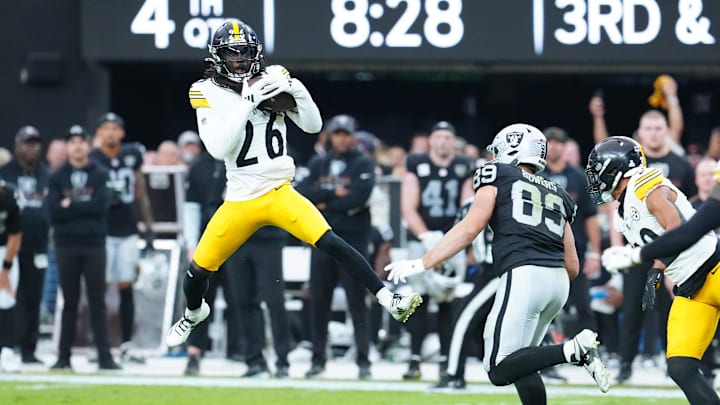 Oct 13, 2024; Paradise, Nevada, USA; Pittsburgh Steelers cornerback Donte Jackson (26) intercepts a pass intended for Las Vegas Raiders tight end Brock Bowers (89) during the fourth quarter at Allegiant Stadium. Mandatory Credit: Stephen R. Sylvanie-Imagn Images