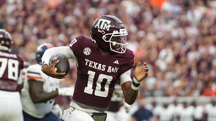 Aug 30, 2025; College Station, Texas, USA; Texas A&M Aggies quarterback Marcel Reed (10) runs with the football in the first quarter against the UTSA Roadrunners at Kyle Field. Mandatory Credit: Sean Thomas-Imagn Images