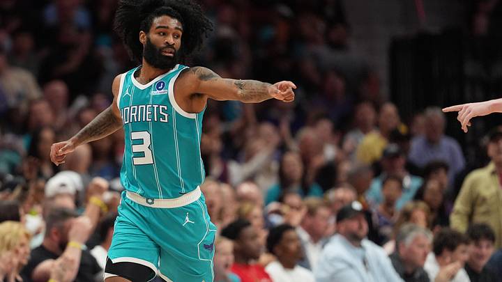 Apr 2, 2026; Charlotte, North Carolina, USA; Charlotte Hornets guard Coby White (3) acknowledges an assist from guard/forward Kon Knueppel (7) during the second quarter against the Phoenix Suns at Spectrum Center. Mandatory Credit: Jim Dedmon-Imagn Images
