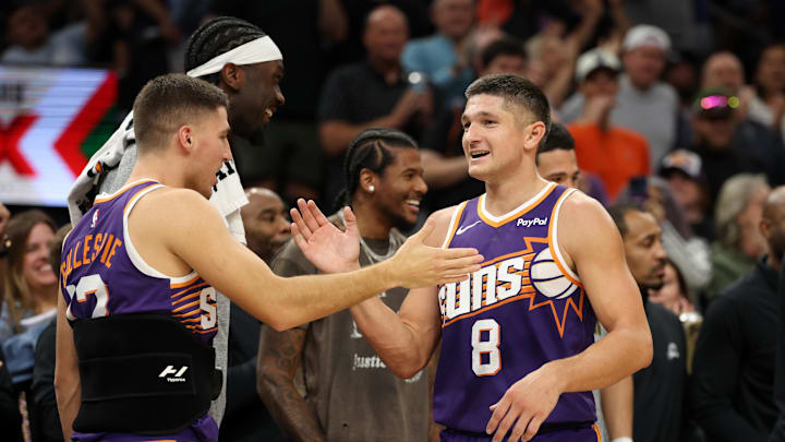Nov 10, 2025; Phoenix, Arizona, USA; Phoenix Suns guard Grayson Allen (8) celebrates with Collin Gillespie after being pulled from the game after setting the franchise record for three pointers in a game against the New Orleans Pelicans in the second half at the Mortgage Matchup Center. Mandatory Credit: Mark J. Rebilas-Imagn Images