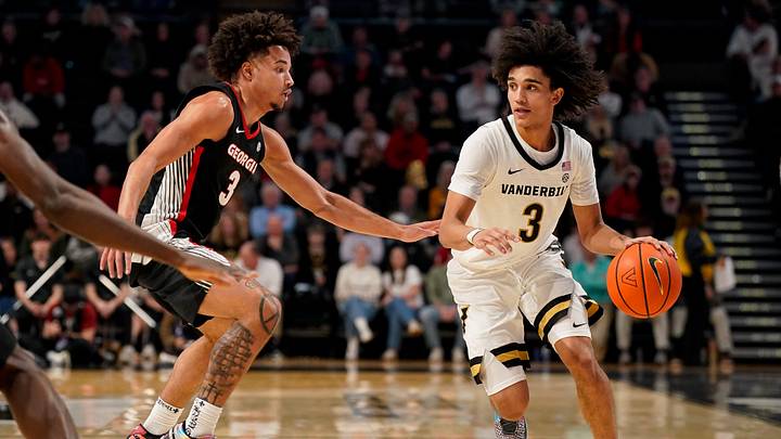 Vanderbilt guard Tyler Tanner (3) pushes up the court with Georgia guard Jordan Ross (3) during the second half at Memorial Gym in Nashville, Tenn., Wednesday, Feb. 25, 2026. Vanderbilt guard Tyler Tanner (3) pushes up the court with Georgia guard Jordan Ross (3) during the second half at Memorial Gym in Nashville, Tenn., Wednesday, Feb. 25, 2026.