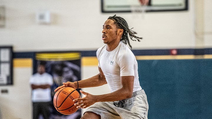 Wayne Memorial's Carlos Medlock Jr. looks to shoot during a boys basketball open gym on Wednesday, July 31, 2024. Wayne Memorial's Carlos Medlock Jr. looks to shoot during a boys basketball open gym on Wednesday, July 31, 2024.