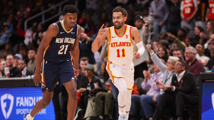 Dec 2, 2024; Atlanta, Georgia, USA; Atlanta Hawks guard Trae Young (11) reacts after a three pointer against the New Orleans Pelicans in the fourth quarter at State Farm Arena. Mandatory Credit: Brett Davis-Imagn Images