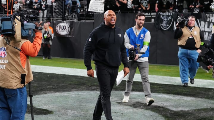 Jan 7, 2024; Paradise, Nevada, USA; Las Vegas Raiders interim head coach Antonio Pierce cheers with fans after the Raiders defeated the Denver Broncos 27-14 at Allegiant Stadium. Mandatory Credit: Stephen R. Sylvanie-USA TODAY Sports Jan 7, 2024; Paradise, Nevada, USA; Las Vegas Raiders interim head coach Antonio Pierce cheers with fans after the Raiders defeated the Denver Broncos 27-14 at Allegiant Stadium. Mandatory Credit: Stephen R. Sylvanie-USA TODAY Sports