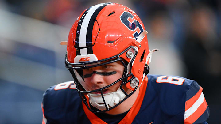 Nov 30, 2024; Syracuse, New York, USA; Syracuse Orange quarterback Kyle McCord (6) warms up prior to the game against the Miami Hurricanes at the JMA Wireless Dome. Mandatory Credit: Rich Barnes-Imagn Images