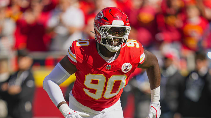 Oct 19, 2025; Kansas City, Missouri, USA; Kansas City Chiefs defensive end Charles Omenihu (90) reacts during the first half against the Las Vegas Raiders at GEHA Field at Arrowhead Stadium. Mandatory Credit: Jay Biggerstaff-Imagn Images