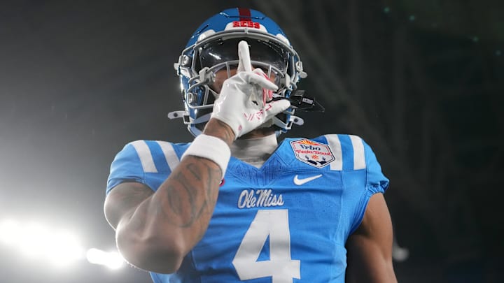 Ole Miss Rebels tight end Caleb Odom (4) celebrates his 2-point conversion catch against the Miami Hurricanes during their Vrbo Fiesta Bowl matchup at State Farm Stadium on Jan. 8, 2026.