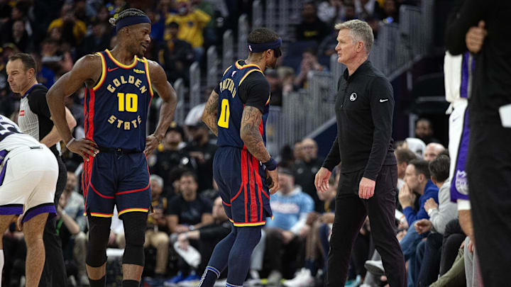 Mar 13, 2025; San Francisco, California, USA; Golden State Warriors head coach Steve Kerr (right) confers with players Jimmy Butler III (10) and Gary Payton II (0) during the second quarter at Chase Center. Mandatory Credit: D. Ross Cameron-Imagn Images