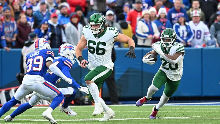 Dec 29, 2024; Orchard Park, New York, USA; New York Jets center Joe Tippmann (66) leads a block for running back Breece Hall (20) as Buffalo Bills cornerback Cam Lewis (39) tries to make a tackle in the fourth quarter at Highmark Stadium. Mandatory Credit: Mark Konezny-Imagn Images Dec 29, 2024; Orchard Park, New York, USA; New York Jets center Joe Tippmann (66) leads a block for running back Breece Hall (20) as Buffalo Bills cornerback Cam Lewis (39) tries to make a tackle in the fourth quarter at Highmark Stadium. Mandatory Credit: Mark Konezny-Imagn Images