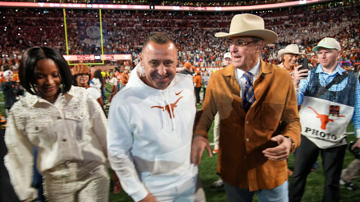 Texas Longhorns head coach Steve Sarkisian and Chris Del Conte celebrate a win over Clemson Tigers 38-24 in the NCAA College Football Playoffs first round game at Darrell K Royal Texas Memorial Stadium, Austin, Texas, Saturday, Dec. 21, 2024.