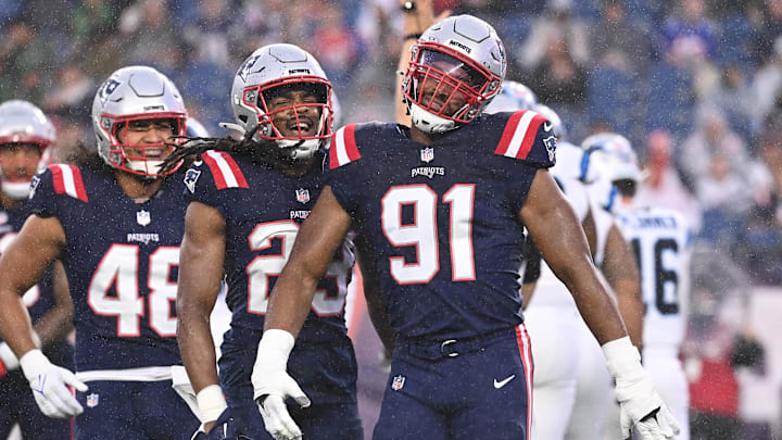 August 8, 2024; Foxborough, MA, USA;  New England Patriots defensive end Deatrich Wise Jr. (91) celebrates his sack against the Carolina Panthers during the first half at Gillette Stadium.