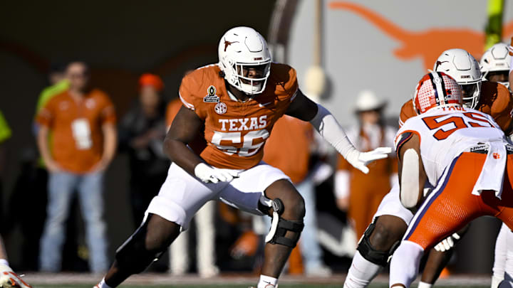 Dec 21, 2024; Austin, Texas, USA; Texas Longhorns offensive lineman Cameron Williams (56) in action during the game between the Texas Longhorns and the Clemson Tigers in the CFP National Playoff First Round at Darrell K Royal-Texas Memorial Stadium. Mandatory Credit: Jerome Miron-Imagn Images