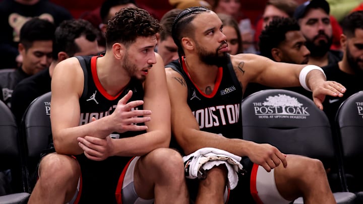 Nov 22, 2024; Houston, Texas, USA; Houston Rockets center Alperen Sengun (28) and forward Dillon Brooks (9) interact on the bench against the Portland Trailblazers during the second quarter at Toyota Center. Mandatory Credit: Erik Williams-Imagn Images