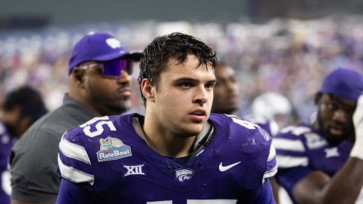 Dec 26, 2024; Phoenix, AZ, USA; Kansas State Wildcats linebacker Austin Romaine (45) against the Rutgers Scarlet Knights during the Rate Bowl at Chase Field. Mandatory Credit: Mark J. Rebilas-Imagn Images