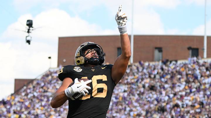 Oct 18, 2025; Nashville, Tennessee, USA;  Vanderbilt Commodores tight end Cole Spence (16) celebrates with his teammates after scoring a touchdown against the Louisiana State Tigers during the second half at FirstBank Stadium. Mandatory Credit: Steve Roberts-Imagn Images