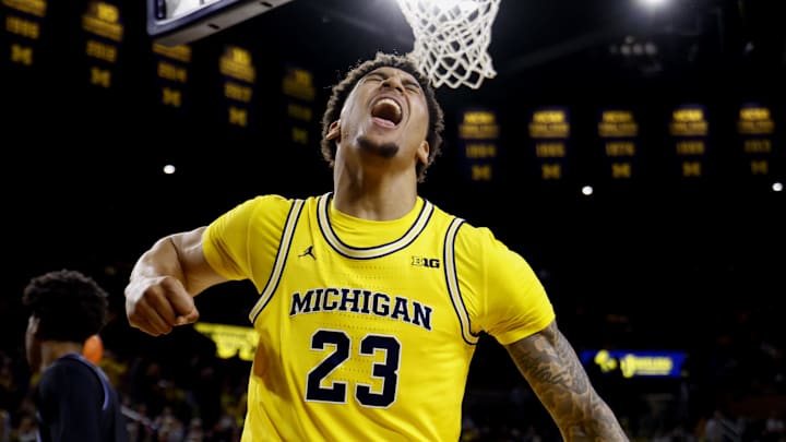 Dec 9, 2025; Ann Arbor, Michigan, USA;  Michigan Wolverines forward Yaxel Lendeborg (23) celebrates after he dunks in the first half against the Villanova Wildcats at Crisler Center. Mandatory Credit: Rick Osentoski-Imagn Images