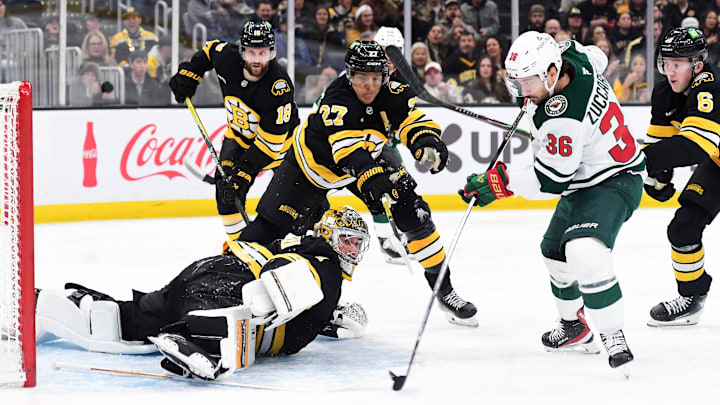 Mar 28, 2026; Boston, Massachusetts, USA; Minnesota Wild right wing Mats Zuccarello (36) shoots the puck on a sprawling Boston Bruins goaltender Jeremy Swayman (1) during the second period at TD Garden. Mandatory Credit: Bob DeChiara-Imagn Images
