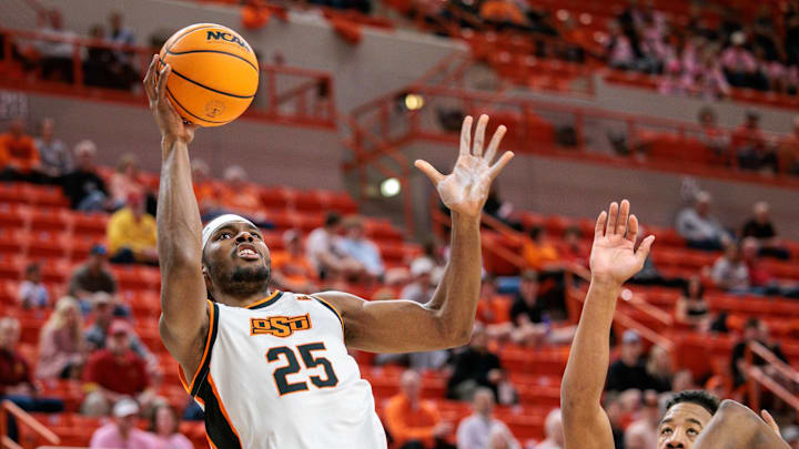 Feb 25, 2025; Stillwater, Oklahoma, USA; Oklahoma State Cowboys forward Robert Jennings II (25) shoots the ball during the first half against the Iowa State Cyclones at Gallagher-Iba Arena. Mandatory Credit: William Purnell-Imagn Images