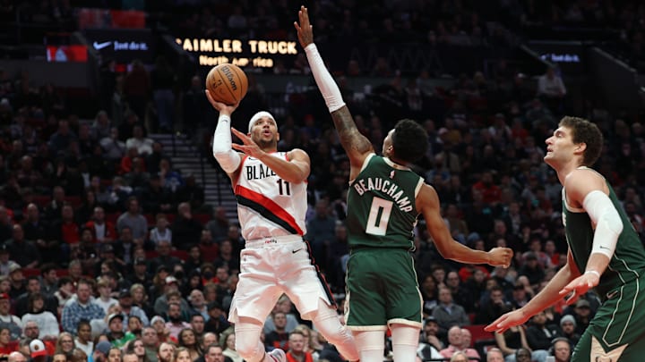 Feb 6, 2023; Portland, Oregon, USA; Portland Trail Blazers guard Josh Hart (11) shoots the ball over Milwaukee Bucks guard MarJon Beauchamp (0) in the second half at Moda Center. Mandatory Credit: Jaime Valdez-Imagn Images Feb 6, 2023; Portland, Oregon, USA; Portland Trail Blazers guard Josh Hart (11) shoots the ball over Milwaukee Bucks guard MarJon Beauchamp (0) in the second half at Moda Center. Mandatory Credit: Jaime Valdez-Imagn Images