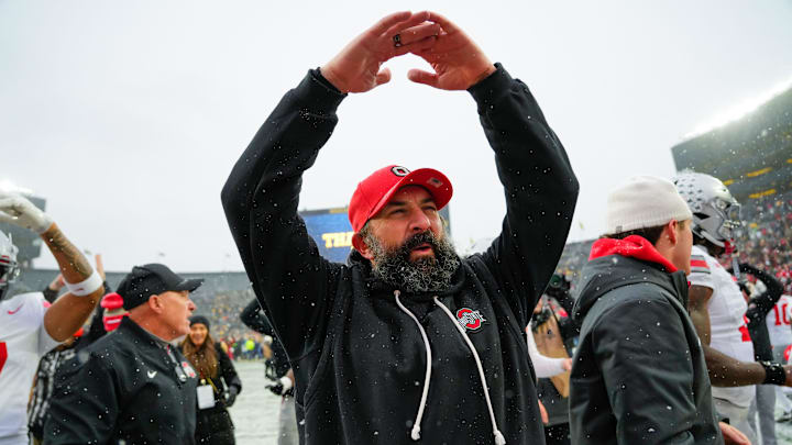 Ohio State Buckeyes defensive coordinator Matt Patricia celebrates after defeating the Michigan Wolverines in the NCAA football game at Michigan Stadium on Saturday, Nov. 29, 2025 in Ann Arbor, Michigan.