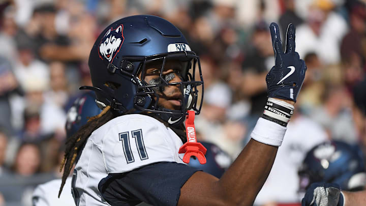 Oct 18, 2025; Chestnut Hill, Massachusetts, USA; UConn Huskies tight end Juice Vereen (11) reacts after scoring a touchdown during the second half against the Boston College Eagles at Alumni Stadium. Mandatory Credit: Bob DeChiara-Imagn Images