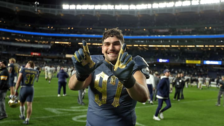 Nov 23, 2024; New York, New York, USA; Notre Dame Fighting Irish defensive lineman Gabriel Rubio (97) celebrates after a win against the Army Black Knights at Yankee Stadium. Mandatory Credit: Danny Wild-Imagn Images