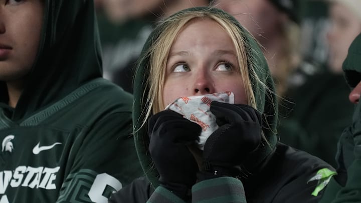 Oct 25, 2025; East Lansing, Michigan, USA; A Michigan State Spartan looks on during the second half of a game against the Michigan Wolverines at Spartan Stadium. Mandatory Credit: Brendan Mullin-Imagn Images Oct 25, 2025; East Lansing, Michigan, USA; A Michigan State Spartan looks on during the second half of a game against the Michigan Wolverines at Spartan Stadium. Mandatory Credit: Brendan Mullin-Imagn Images