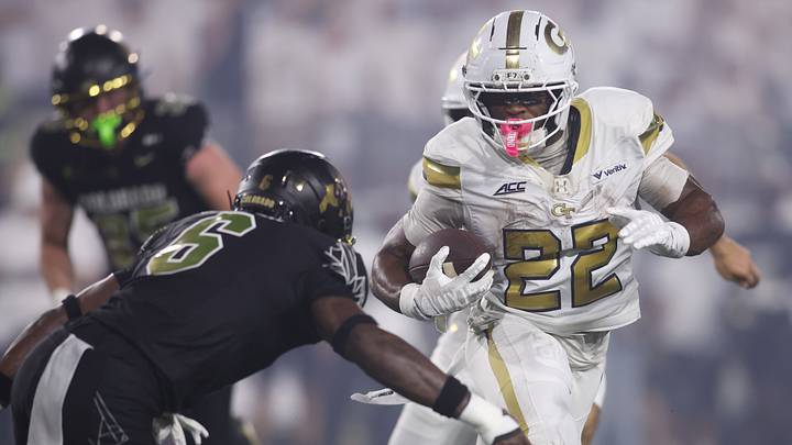 Sep 3, 2026; Atlanta, Georgia, USA;  Georgia Tech Yellow Jackets running back Justice Haynes (22) rushes the ball against Colorado Buffaloes defensive back Boo Carter (6) at Bobby Dodd Stadium at Hyundai Field.  Mandatory Credit: Brett Davis-Imagn Images
