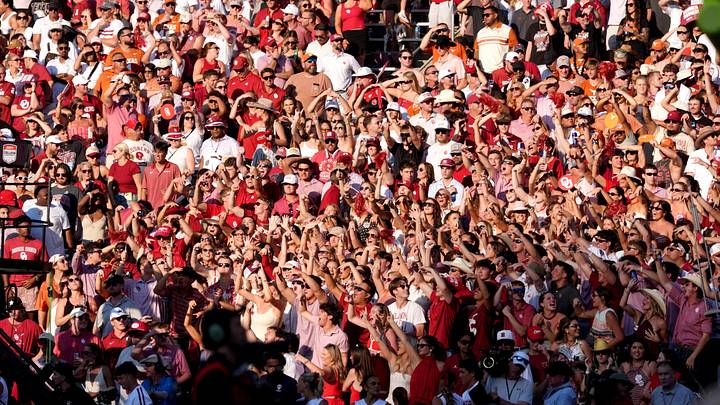 Oklahoma fans cheer in the second half of the Red River Rivalry Oklahoma and Texas at the Cotton Bowl in Dallas on Saturday. A late third-quarter scuffle fired up the Sooners' sidelines and fans, helping OU build momentum for the win. Oklahoma fans cheer in the second half of the Red River Rivalry Oklahoma and Texas at the Cotton Bowl in Dallas on Saturday. A late third-quarter scuffle fired up the Sooners' sidelines and fans, helping OU build momentum for the win.