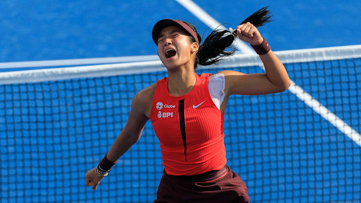 Alex Eala reacts after winning her first Grand Slam main draw match.