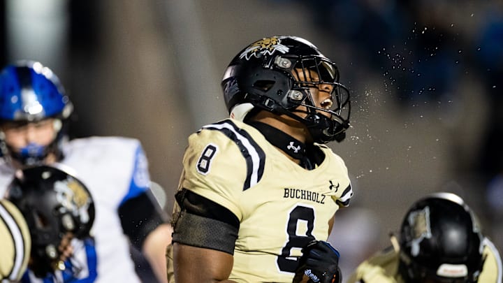 Buchholz Bobcats defensive end Kendall Jackson (8) reacts after a tackle during the first half