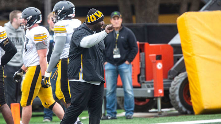 Iowa defensive line coach Kelvin Bell talks with players during a Hawkeye football spring practice on Thursday, April 4, 2019, at the University of Iowa outdoor practice facility in Iowa City, Iowa.

190404 Iowa Fb 009 Jpg