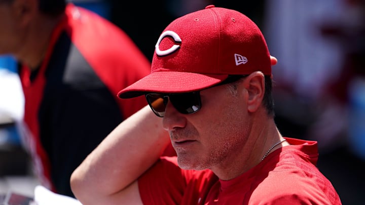 Cincinnati Reds manager David Bell (25) sits in the dugout.