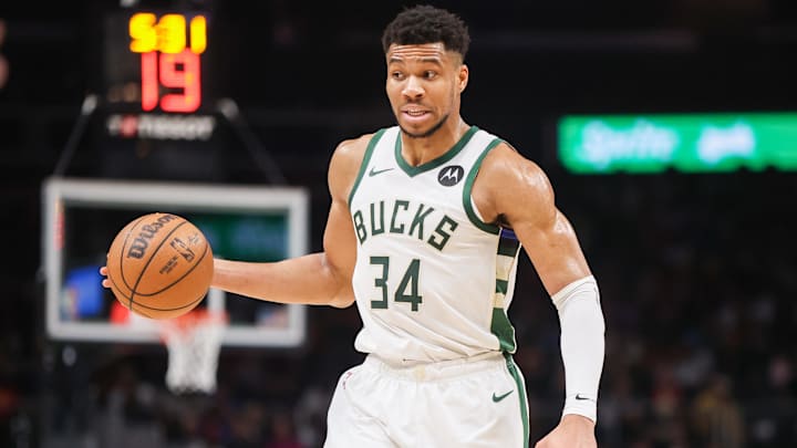 Mar 30, 2024; Atlanta, Georgia, USA; Milwaukee Bucks forward Giannis Antetokounmpo (34) dribbles against the Hawks. 