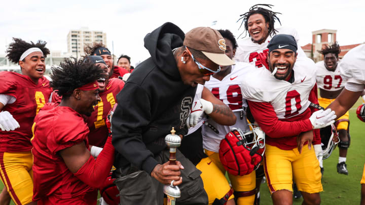 Travis Scott visits the USC Trojans football team.