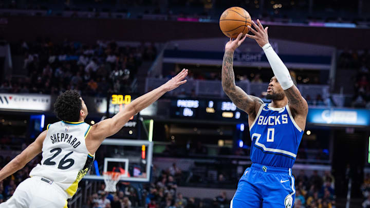 Mar 11, 2025; Indianapolis, Indiana, USA; Milwaukee Bucks guard Damian Lillard (0) shoots the ball while Indiana Pacers guard Ben Sheppard (26) defends in the second half at Gainbridge Fieldhouse. Mandatory Credit: Trevor Ruszkowski-Imagn Images Mar 11, 2025; Indianapolis, Indiana, USA; Milwaukee Bucks guard Damian Lillard (0) shoots the ball while Indiana Pacers guard Ben Sheppard (26) defends in the second half at Gainbridge Fieldhouse. Mandatory Credit: Trevor Ruszkowski-Imagn Images