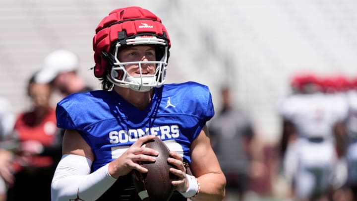 Oklahoma's John Mateer looks to throw a pass during the University of Oklahoma Sooners Crimson Combine at Gaylord Family - Oklahoma Memorial Stadium in Norman, Okla., Saturday, April, 12, 2025.